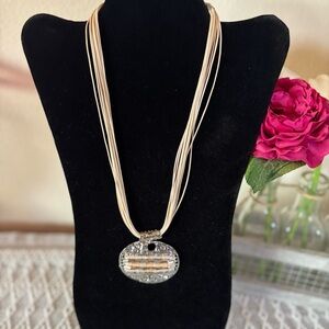 18" layered necklace with beaded hammered oval pendant. Pale peach and silver.